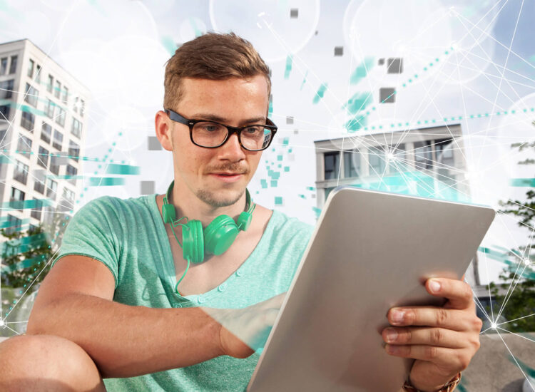 Male holding a tablet in his hands and reading about WebTerm.